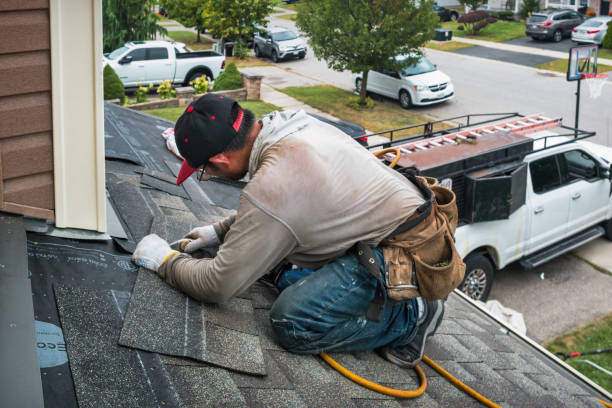 Professional Roof Replacement technician working in Sandy Hook, CT